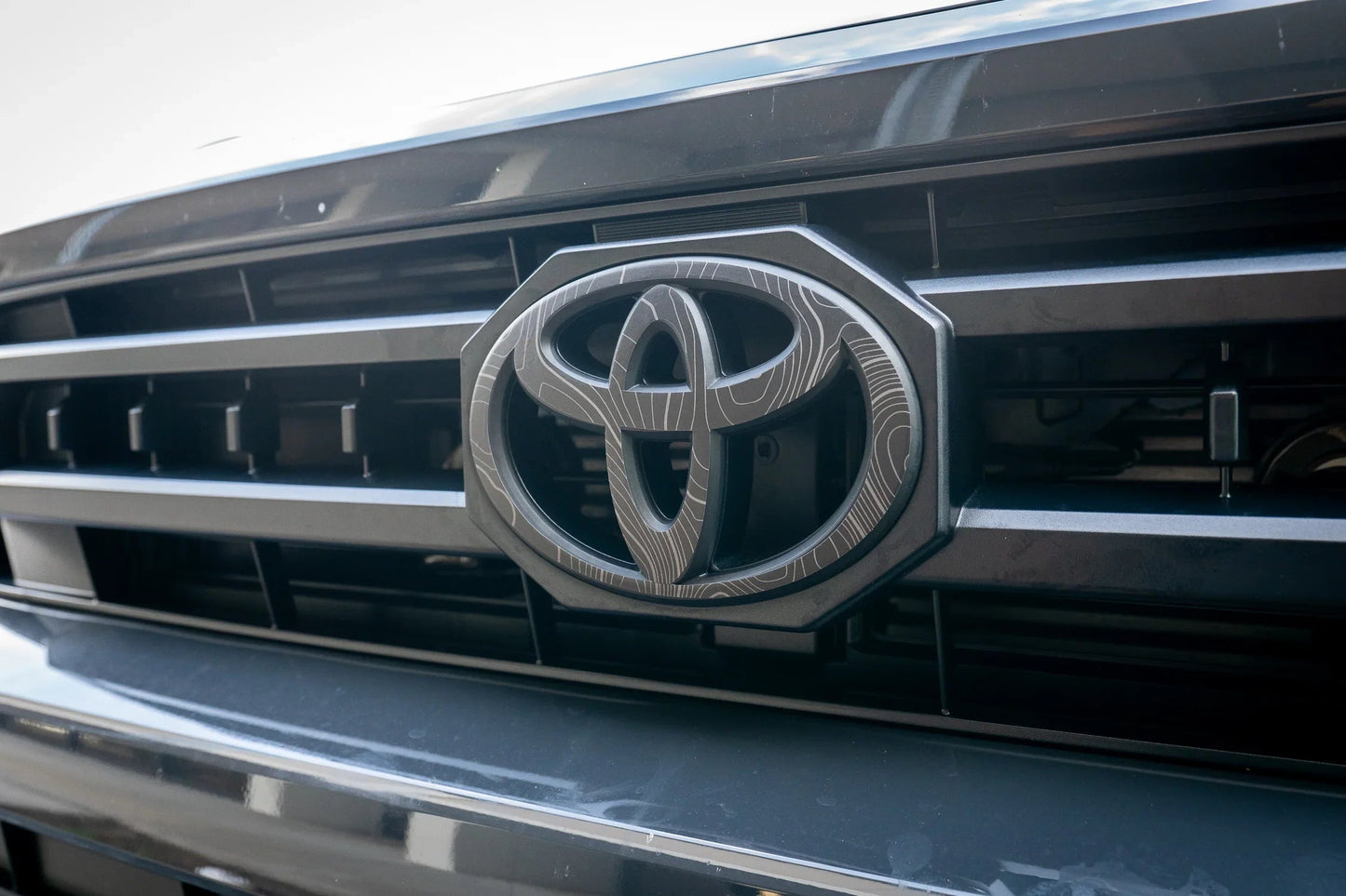 Front OEM Cover Topographic Overlays - *2024+ Tacoma / *2025+ 4Runner