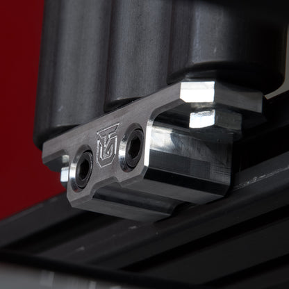Billet aluminum Rotopax mount adapter for extrusion roof rack cross bars.