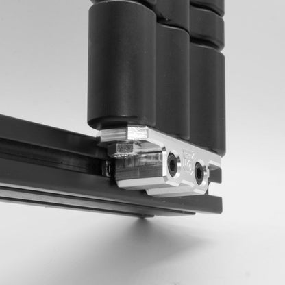 Billet aluminum Rotopax mount adapter for extrusion roof rack cross bars.